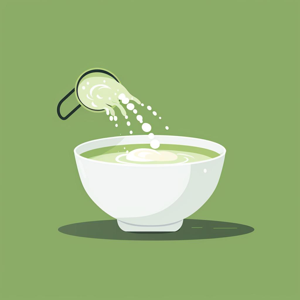 A frother creating froth in a bowl of matcha latte.
