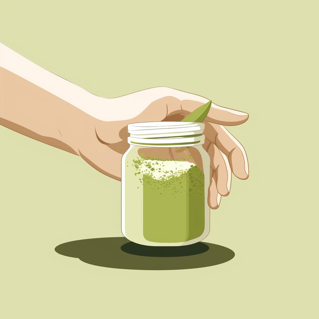 A hand placing matcha powder in an airtight container