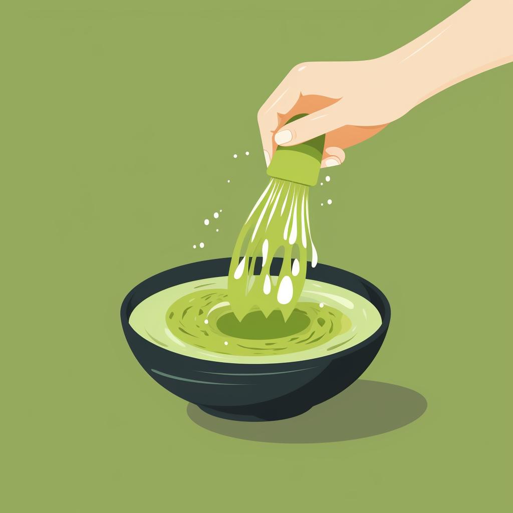 Matcha powder being mixed with water to form a paste.